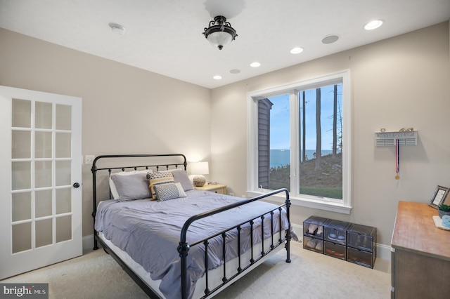 bedroom featuring carpet floors, baseboards, and recessed lighting