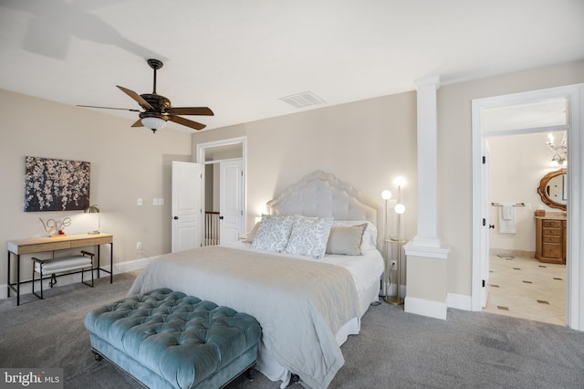 bedroom featuring carpet floors, baseboards, visible vents, and ornate columns