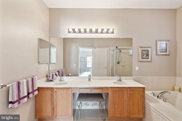 bathroom featuring tile patterned floors, vanity, and independent shower and bath