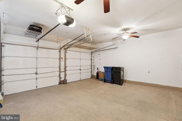 garage with ceiling fan and a garage door opener