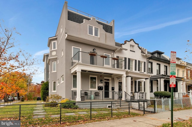 view of property featuring a fenced front yard