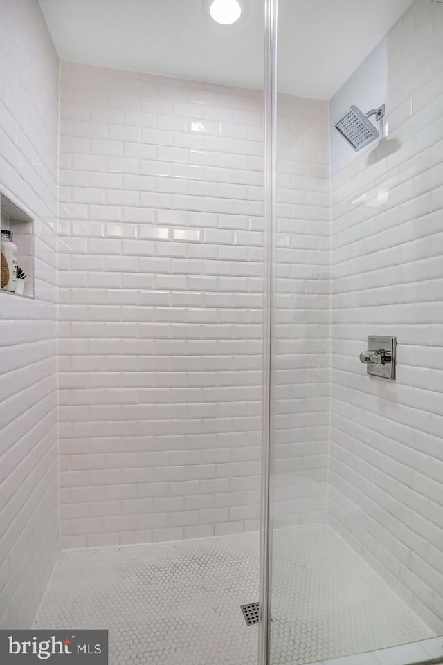 full bath featuring a stall shower