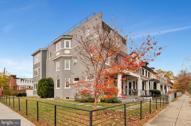 view of property with a fenced front yard