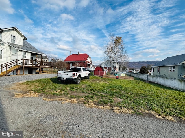 view of yard featuring a deck