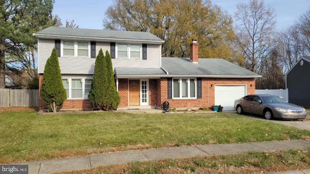 46 Upland Ct, Newark, DE 19713 - traditional home with an attached garage, brick siding, a chimney, and driveway