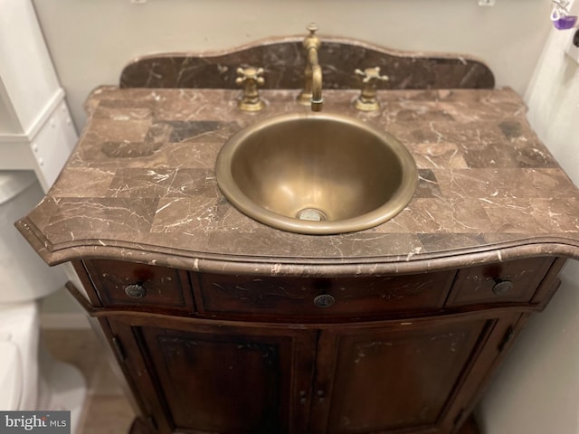 room details featuring tasteful backsplash and sink