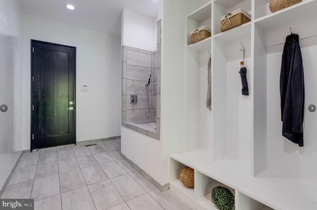 mudroom with light tile patterned floors