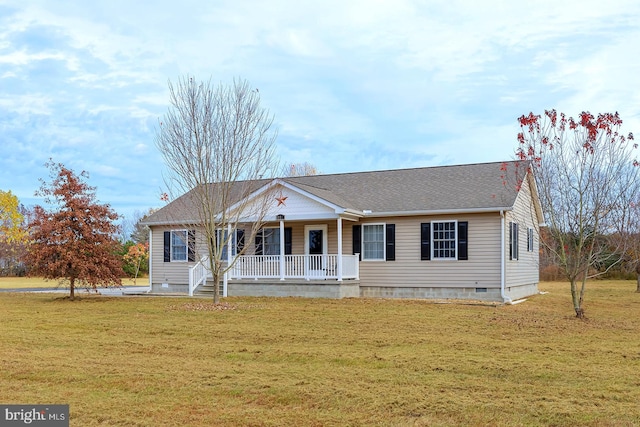 view of front of home with covered porch and a front yard