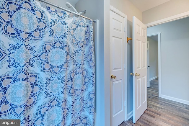 bathroom featuring hardwood / wood-style flooring