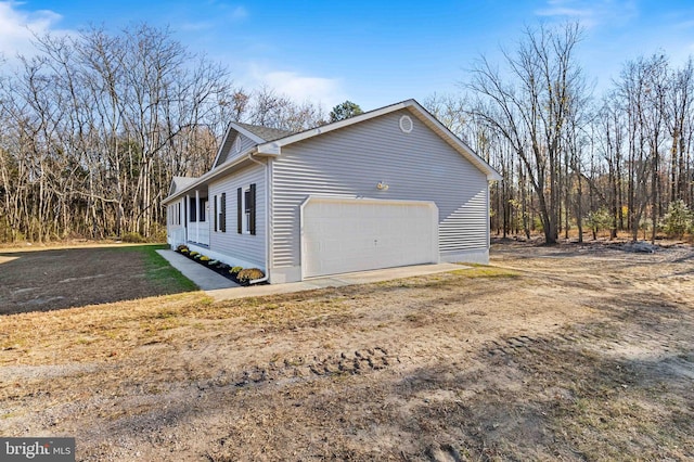 view of home's exterior featuring a garage