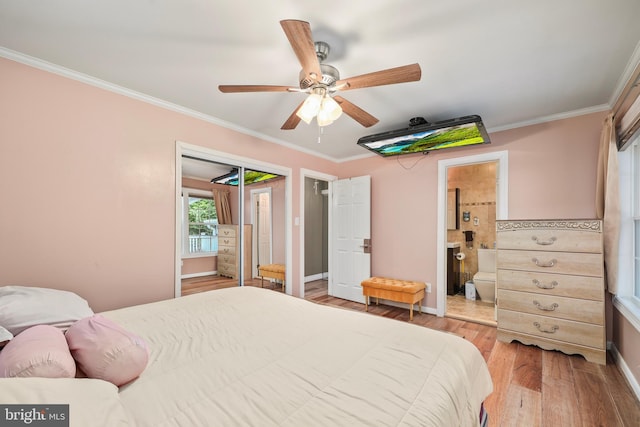 bedroom with ensuite bath, ceiling fan, light hardwood / wood-style flooring, and ornamental molding