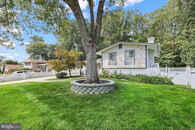 view of front of house with a front lawn