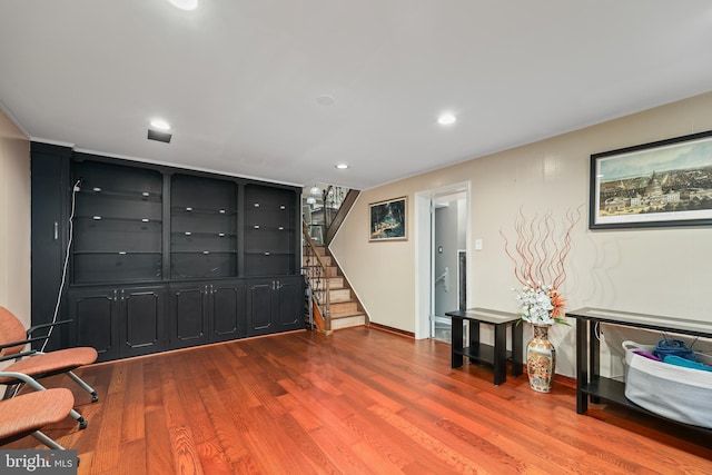 living area with wood-type flooring