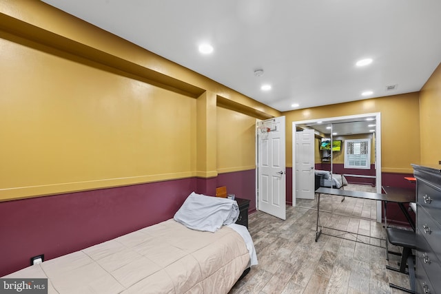 bedroom featuring hardwood / wood-style flooring