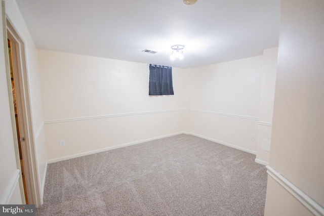 basement featuring carpet flooring