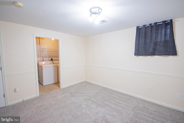 spare room with light colored carpet