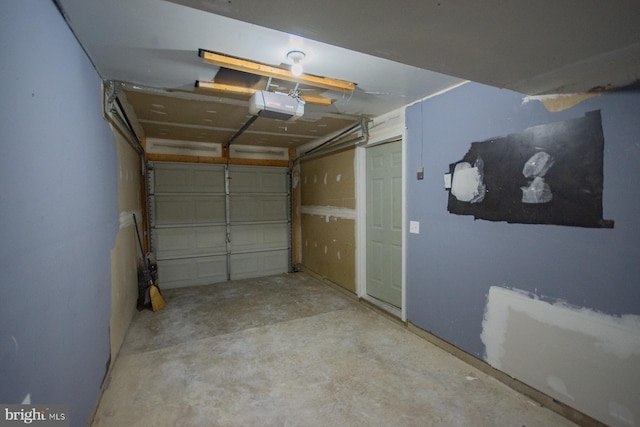 garage featuring a garage door opener