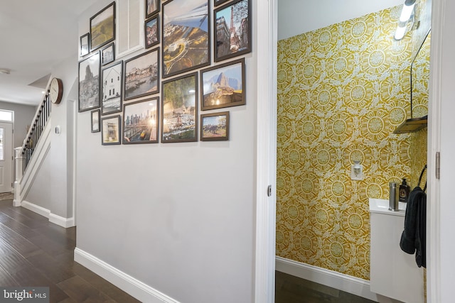 corridor featuring dark hardwood / wood-style flooring