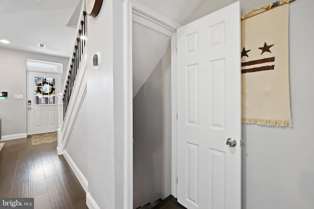 stairway featuring hardwood / wood-style floors