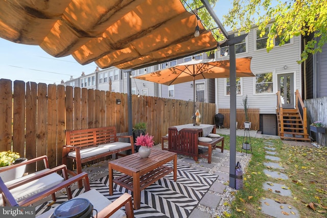 view of patio / terrace with a pergola and an outdoor hangout area