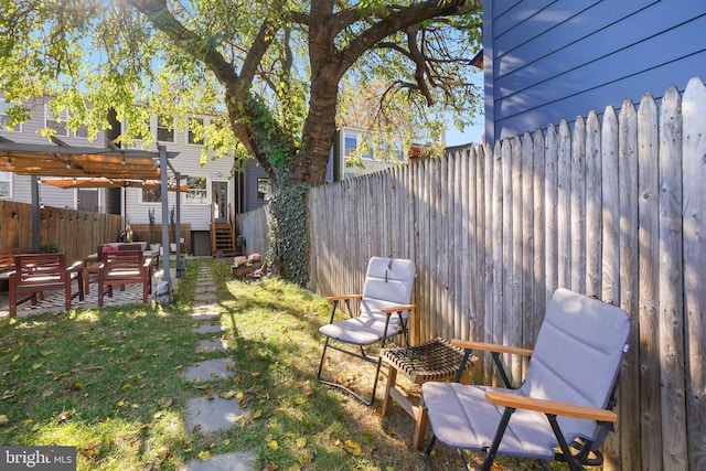 view of yard with a pergola