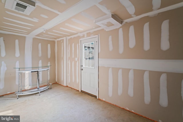 interior space featuring concrete floors