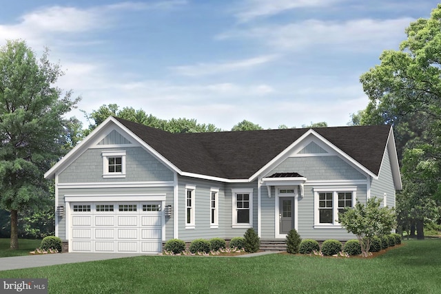 view of front of property with a front lawn and a garage