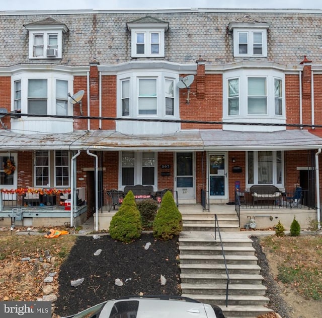 multi unit property featuring covered porch