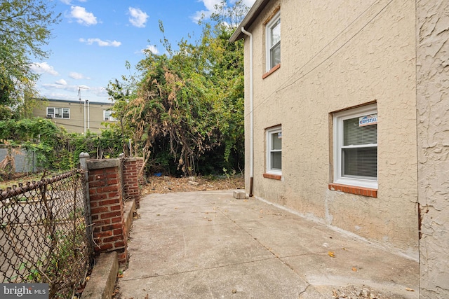 view of home's exterior featuring a patio