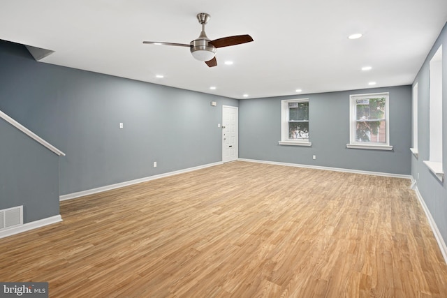 interior space featuring light hardwood / wood-style flooring and ceiling fan