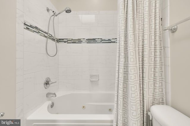 bathroom featuring shower / bath combination with curtain