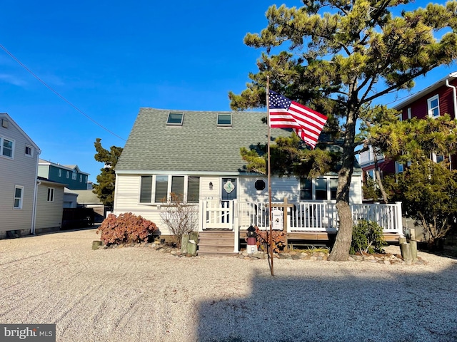 view of front of house featuring a wooden deck