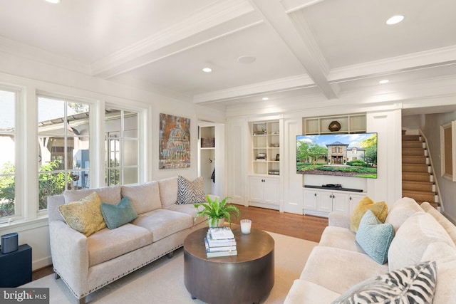 living room with recessed lighting, stairway, ornamental molding, wood finished floors, and beamed ceiling