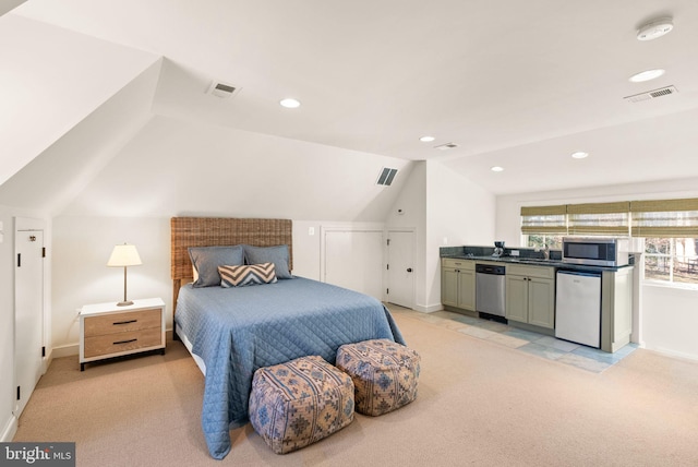 bedroom featuring light carpet, lofted ceiling, and visible vents