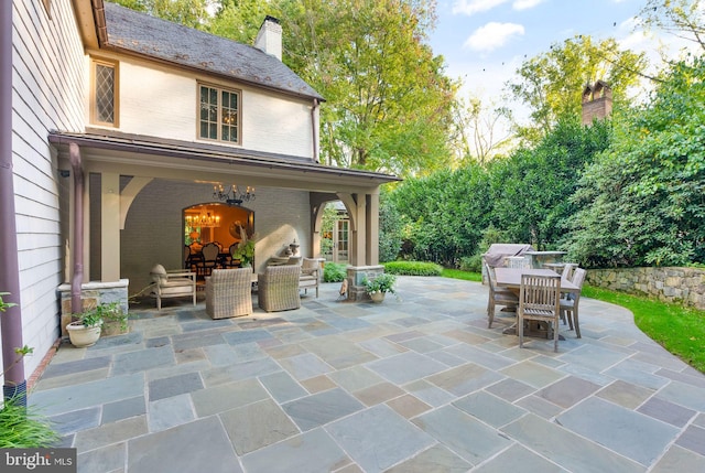 view of patio with outdoor dining area