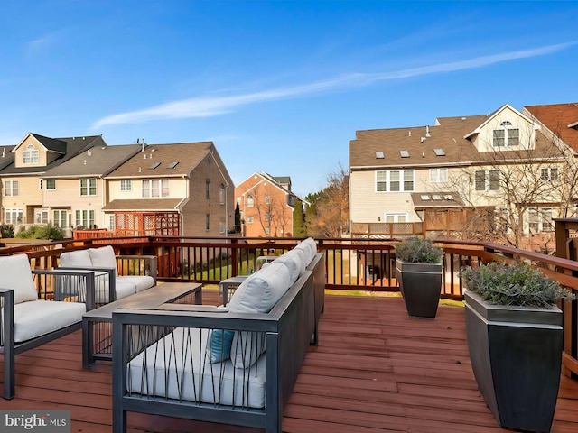 deck with an outdoor hangout area