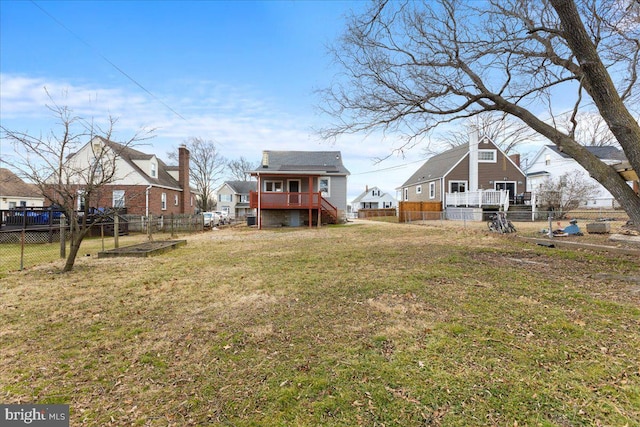 view of yard featuring a wooden deck