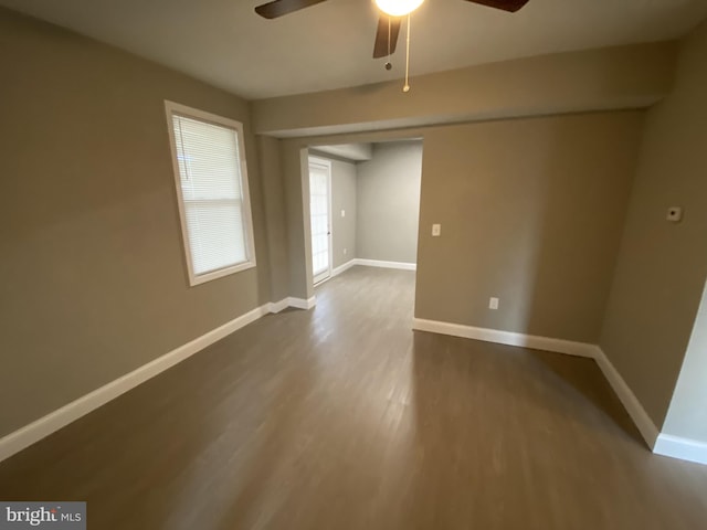 spare room featuring ceiling fan and wood-type flooring