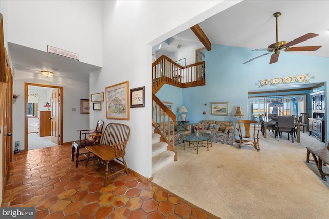 66 Pelican Dr, Avalon, NJ 08202 - carpeted living room with high vaulted ceiling, stairway, a ceiling fan, beamed ceiling, and baseboards