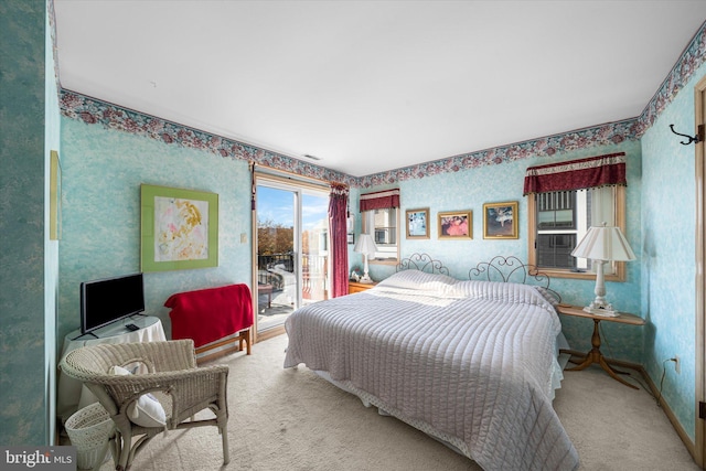 66 Pelican Dr, Avalon, NJ 08202 - carpeted bedroom featuring access to exterior, wallpapered walls, and baseboards