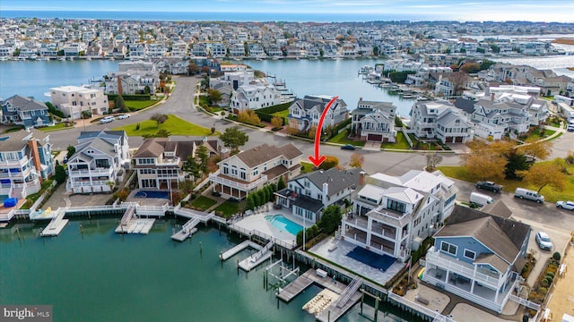 66 Pelican Dr, Avalon, NJ 08202 - aerial view of residential area with a large body of water