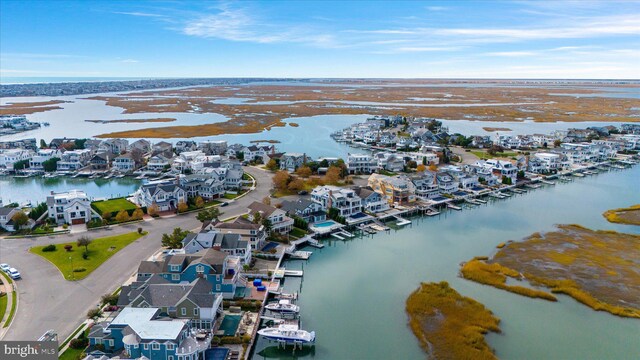 66 Pelican Dr, Avalon, NJ 08202 - aerial perspective of suburban area with a nearby body of water