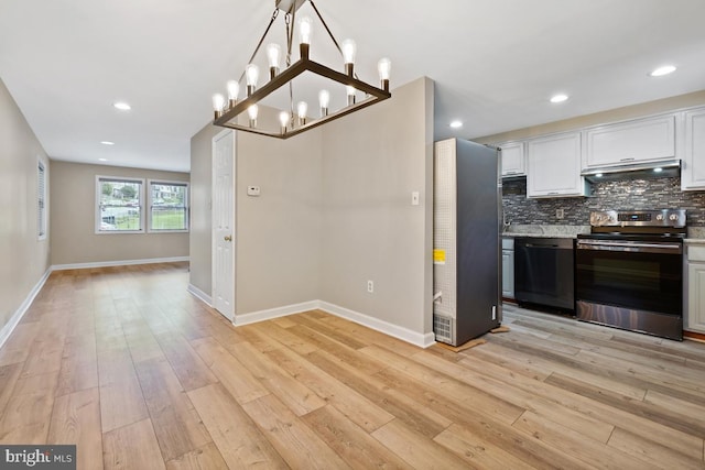 kitchen featuring light hardwood / wood-style floors, stainless steel electric range, black dishwasher, hanging light fixtures, and white cabinets