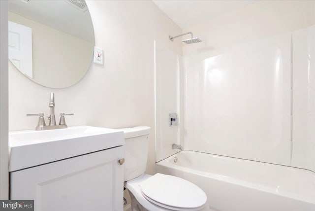 full bathroom with bathing tub / shower combination, vanity, and toilet