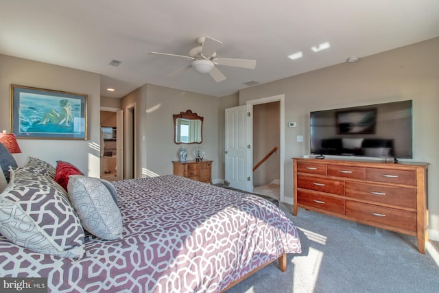 carpeted bedroom with ceiling fan