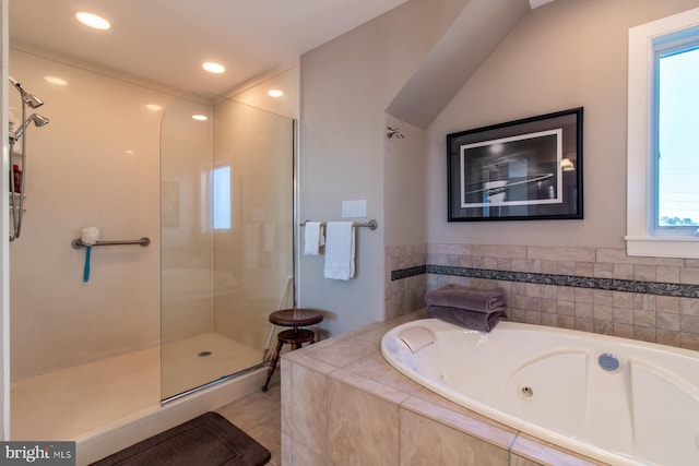 bathroom featuring plus walk in shower