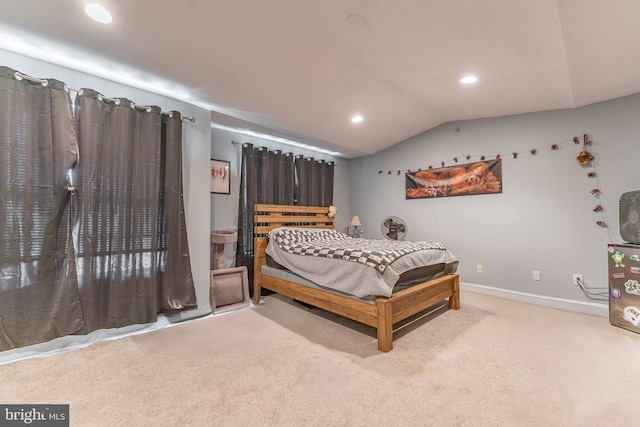 carpeted bedroom featuring lofted ceiling