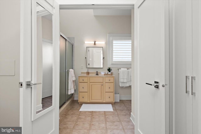 bathroom with vanity and an enclosed shower