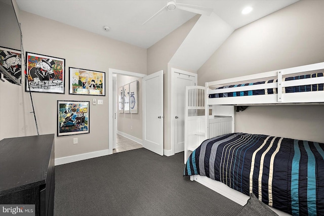 unfurnished bedroom featuring carpet and lofted ceiling