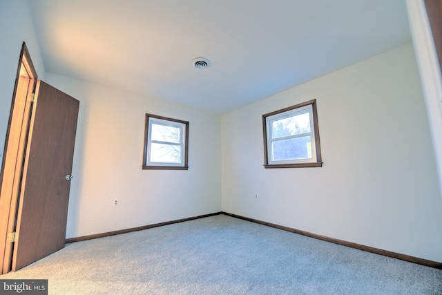 view of carpeted spare room